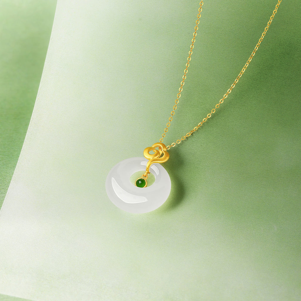 999.9 24K Gold Pendant Heitian Jade 0.8-1g Ping An Kou Y0411798