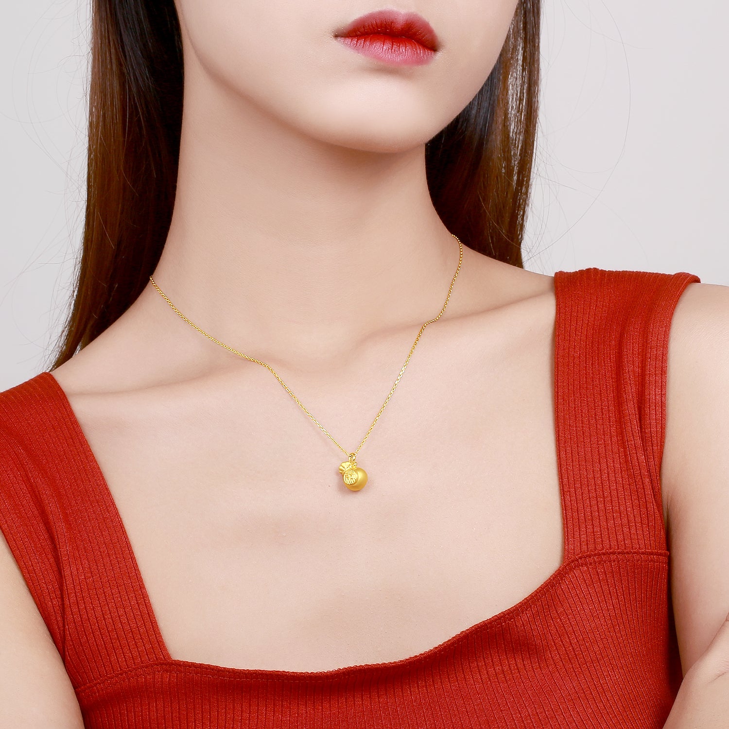   24K Gold Pendant              Fortune Bag 1.1-1.4g AE046952